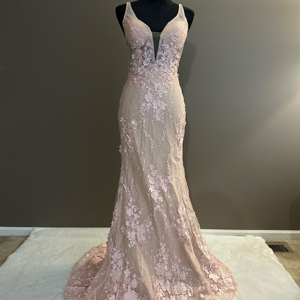 Pink sleeveless plunge gown for prom